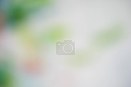background, beautiful white and green bokeh abstract background or surface template with noise effects. blurred abstract surface template with blurry green and orange color effects on white