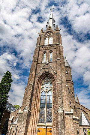 Photo for Church of St. Lawrence in the city of Weeps, Netherlands. The temple against the blue sky - Royalty Free Image