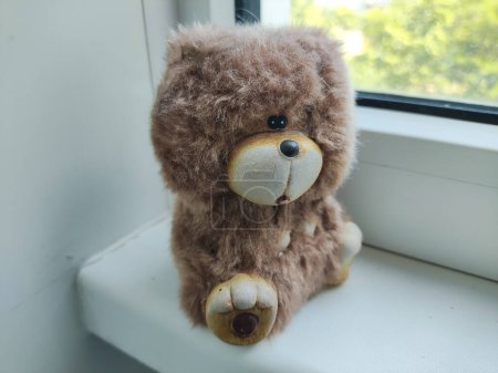 small toy bear. teddy bear figurine.