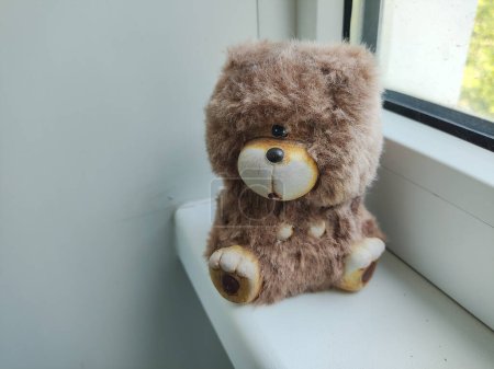 small toy bear. teddy bear figurine.
