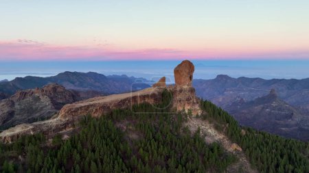 Photo for Aerial shot picturesque paradise of Roque Nublo, Flight over of a volcanic rock in caldera of Tejeda, Gran Canaria, Canary islands, Spain. - Royalty Free Image