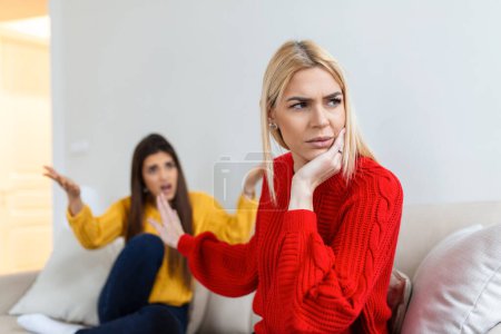 Photo for Woman apologizes to her friend after fight. Repentant woman hope for forgiveness from sad pensive friend. Family on verge of divorce. Couple treason problem concept - Royalty Free Image