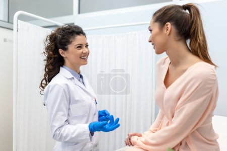 Photo for Patient woman getting a consultation on the results of the analyzes from her gynecologist. Gynecology and treatment of gynecological diseases - Royalty Free Image