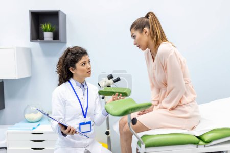 Gynecologist consultation, women's health treatment and diagnosis of diseases of the reproductive system. Checking the female health, exam ovaries, and uterus in the gynecology office.
