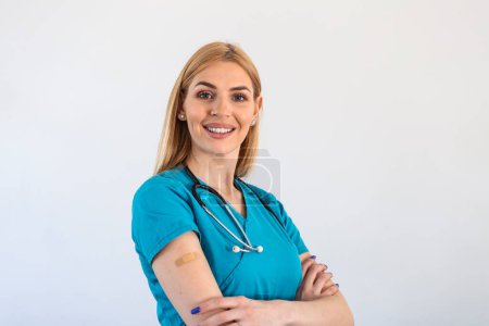 Photo for Vaccinated young Doctor, medical worker, nurse Woman Approving Vaccination, white Background - Royalty Free Image