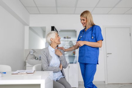 Photo for Healthcare and medical concept - doctor with patient in hospital. Doctor working in the office and listening to the patient, she is explaining her symptoms, health care and assistance concept - Royalty Free Image