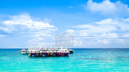 Photo for Similan islands - November 10, 2023: Cruise yachts and boats near the Similan Islands - most famous islands with paradise views, snorkeling and diving spots - Royalty Free Image