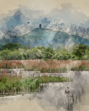 Foto de Digitally created watercolour painting of Beautiful landscape image of Glastonbury Tor in Somerset during Spring sunrise over the Levels - Imagen libre de derechos