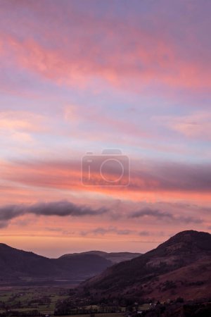 Photo for Beautiful Winter sunset landscape over Skiddaw range looking towards Bassenthwaite Lake in Lake District - Royalty Free Image