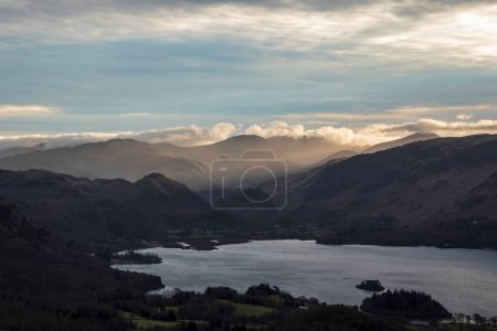 Photo for Absolutely stunning landscape image of view across Derwentwater from Latrigg Fell in lake District during Winter beautiful colorful sunset - Royalty Free Image