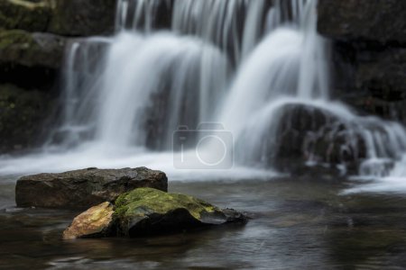 Photo for Beautiful peaceful landscape image of Scaleber Force waterfall in Yorkshire Dales in England during Winter morning - Royalty Free Image