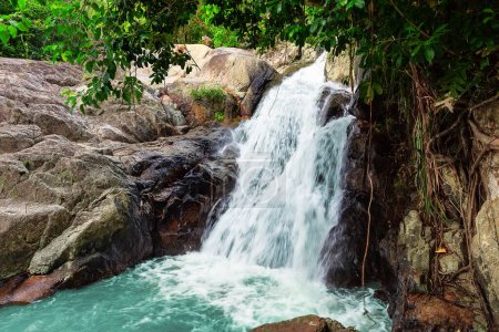 Photo for Beautiful deep forest waterfall in Thailand. Deep rain forest jungle waterfall at Erawan waterfall National Park Kanchanaburi in Thailand. - Royalty Free Image