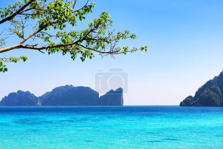 Photo for View from beautiful tropical Phi Phi island in Krabi province, Thailand. Famous Koh Phi-Phi Don island with white sand beach and turquoise water under blue sky in Thailand. - Royalty Free Image