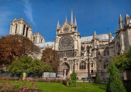 Photo for Notre Dame cathedral in Paris before the devastating fire, seen from the side with round rosace window - Royalty Free Image