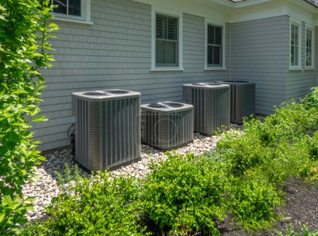 Photo for Heat pumps used for both air conditioning and heating a modern house - Royalty Free Image