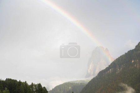 Rainbow over Sassolungo in the Dolomites, South Tyrol Italy