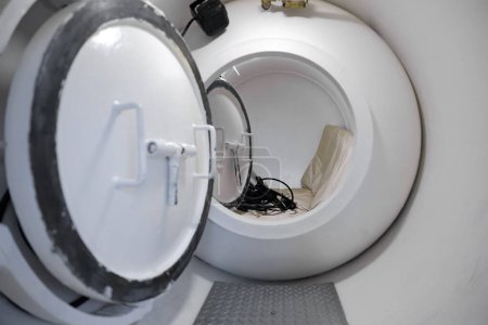 Interior of a white hyperbaric chamber