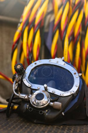 Close up of commercial diving helmet on the boat