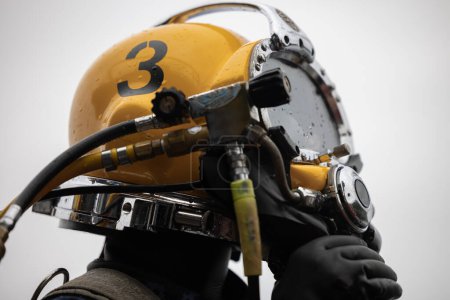 Close up of commercial diver in helmet