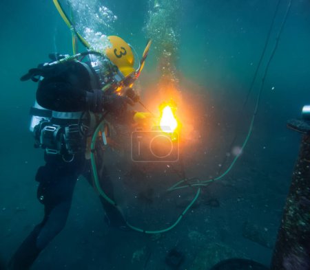 Underwater oxy-fuel in deep ocean depths closeup