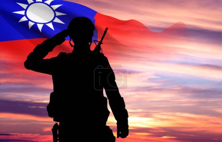 Silhouette of soldier with Taiwan flag against the sunset sky