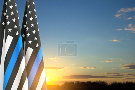 Photo for Thin Blue Line. American flag with police blue line on a background of sunset. Support of police and law enforcement. National Law Enforcement Appreciation Day - Royalty Free Image