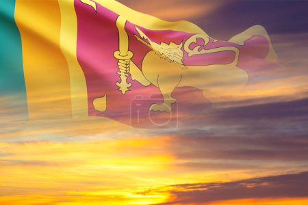 Flag of Sri Lanka against the sunset sky