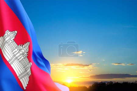 Kambodschanische Flagge gegen den Sonnenuntergang. Hintergrund der Feiertage. Kambodscha-Flagge zum Unabhängigkeitstag