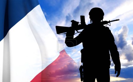 Ilustración de Silhouette of French soldier on background of sky and French flag. Concept - Armed Forces. EPS10 vector - Imagen libre de derechos