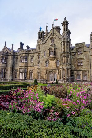 Photo for Gothic style Victorian mansion house. Tudor Gothic Mansion elevation detail of stonework - Margam castle. Margam Country Park, Margam, Port Talbot, South Wales, United Kingdom - 15th of October 2022 - Royalty Free Image