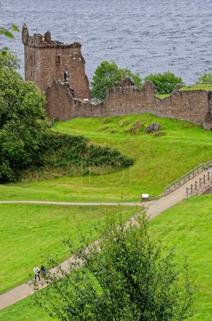 Photo for Scottish tourist attraction - Ruins of Urquhart Castle on the western shore of Loch Ness (site of many Nessie sightings) - Drumnadrochit, Highland, Scotland, United Kingdom - 1st of September 2012 - Royalty Free Image