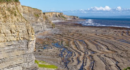 Photo for Dunraven Bay and beach, a very popular beach at Southerndown on the Glamorgan Heritage Coast, South Wales, United Kingdom. 25th of July, 2023 - Royalty Free Image