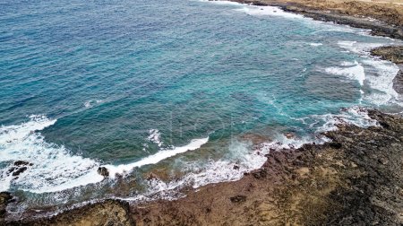 Foto de Vista aérea de Playa del Mejillón o Playa del Bajo de la Burra, llamada Popcorn Beach - España, Islas Canarias, Fuerteventura. 24.09.2023 - Imagen libre de derechos