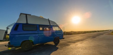 Transporter Camping Van bus at the California Ocean in the coastal Nature 