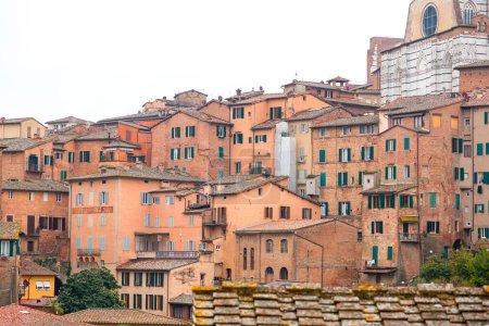 Generic architecture and cityscape view from the historical Italian city of Siena in Tuscany.