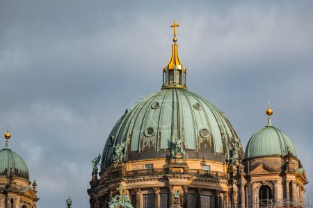 Exterior view of the Berlin Cathedral or Berliner Dom along the river Spree on the Museum Island of Berlin.