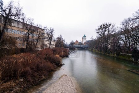 Isar River passing through Munich and the cityscape around the riverbank. With 295 km length, it is among the longest rivers in Bavaria.