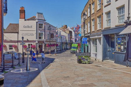 Photo for Eton High Street is seen from the Windsor Eton Bridge with its shops and pubs - Royalty Free Image