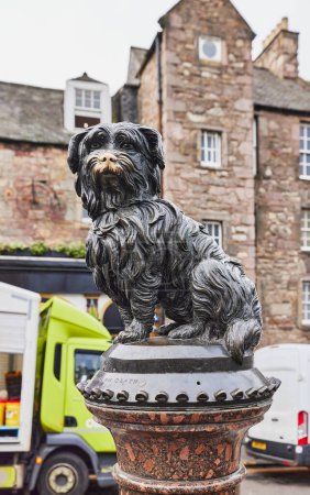 Photo for Greyfriars Bobby Skye Terrier became known in 19th-century in Edinburgh for spending 14 years guarding the grave of his owner in Scotland, UK - Royalty Free Image