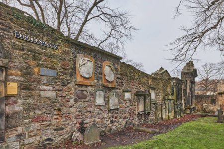 Graves on a hill at Greyfriars Kirkyard in Edinburgh, Scotland, UK