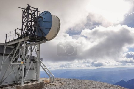 Photo for High antennas on the top of a mountain in austria with white clouds on the sky - Royalty Free Image