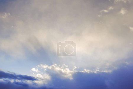 Photo for Clouds and wonderful sunrays after a storm with rain in the spring - Royalty Free Image