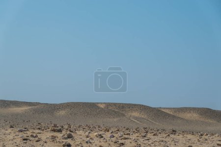 soft dunes of sand in the desert from egypt with blue sky in the summer