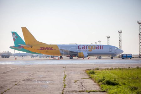 Photo for Kyiv, Ukraine - October 29, 2019: DHL cargo plane at the runway of international airport Boryspil. Cargoair airlines. Delivery air transport - Royalty Free Image