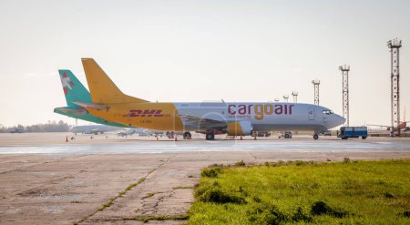 Photo for Kyiv, Ukraine - October 29, 2019: DHL cargo plane at the runway of international airport Boryspil. Cargoair airlines. Delivery air transport - Royalty Free Image