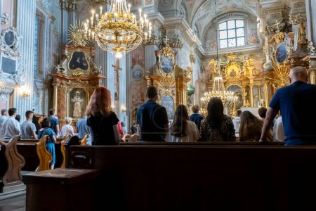 Photo for People at the church. Prayer in the Cathedral. Warsaw, Poland - July 27, 2023. - Royalty Free Image
