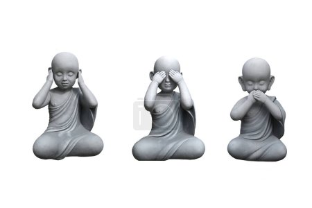 Photo for A group of three small wise monk statues  isolated on white (see no evil, hear no evil, speak no evil) - Royalty Free Image