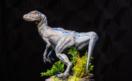 Photo for Velociraptor Dinosaur in the dark - Royalty Free Image