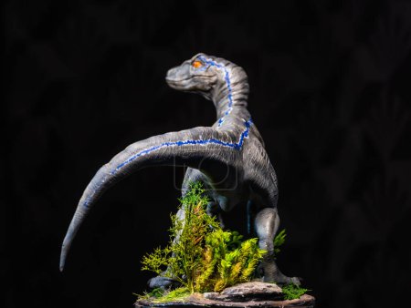 Photo for Velociraptor Dinosaur in the dark - Royalty Free Image