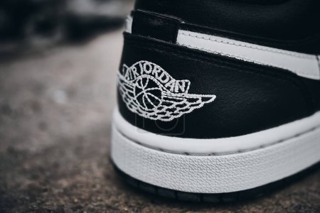 Photo for Wings logo on Nike Air Jordan I Black White sneakers quarter illustrative editorial - Royalty Free Image